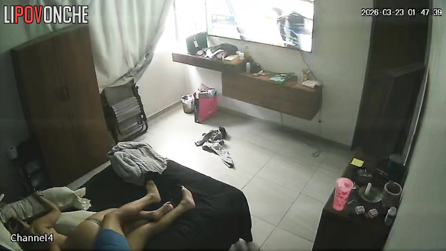 A man is eagerly licking his wife's hot pussy while she watches TV