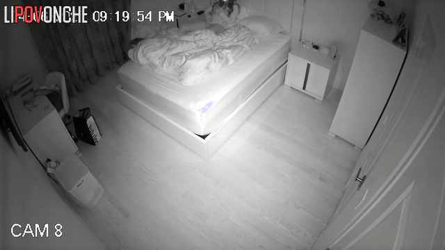 A charming young girl gently caresses her clitoris while everyone is asleep