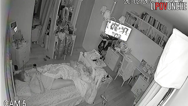 In the middle of the night, a pretty girl is playing with her seductive pussy