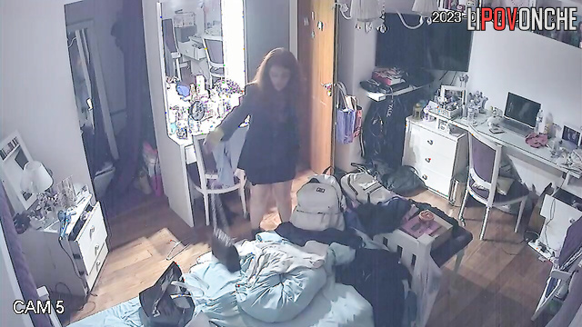 A girl with long red hair takes off gorgeous dress, revealing her beautiful tits
