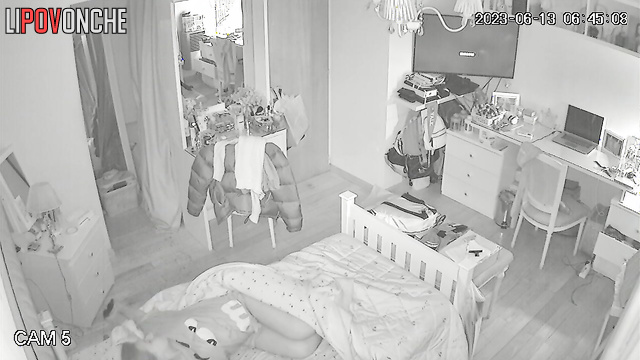 A redheaded girl wakes up and bares her tits as she gets dressed for college
