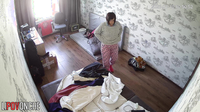 A hidden bedroom camera captured the milf's seductive bare breasts