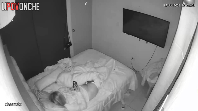 A cutie is messaging on her phone while the vibrator is pressed against her clitoris