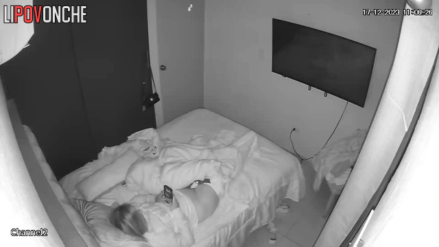 A cutie is messaging on her phone while the vibrator is pressed against her clitoris