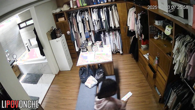 A sultry beauty walks into the locker room wearing seductive white lingerie