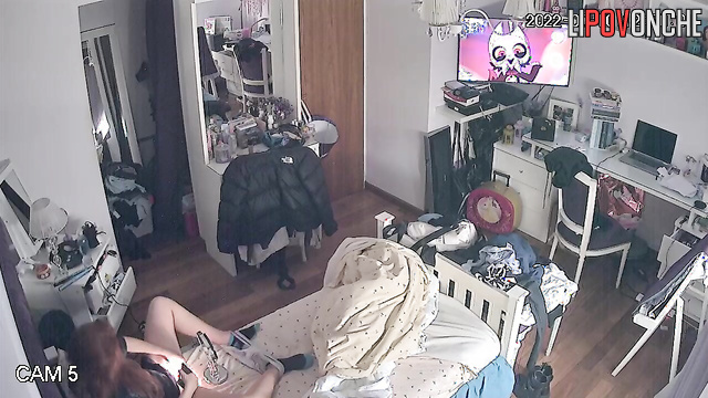 After her orgasm, the curious girl looks at her wet pussy in the mirror