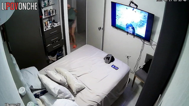 A completely naked brunette is rummaging through the closets, looking for clothes