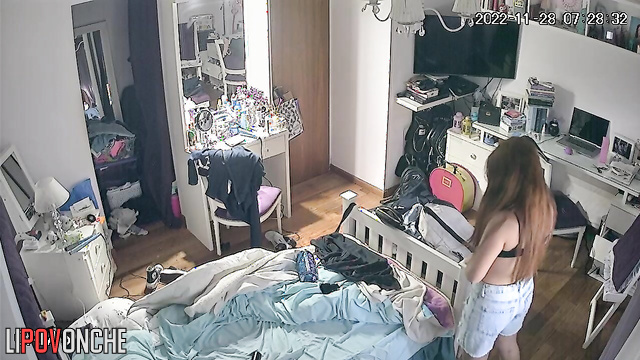After locking herself in her room, the pretty girl stripped down to her panties