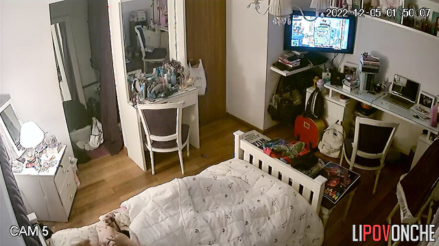 The girl is actively moving her sexy legs during a pleasurable orgasm