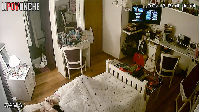 A young girl has a passionate orgasm while intently watching porn on her phone