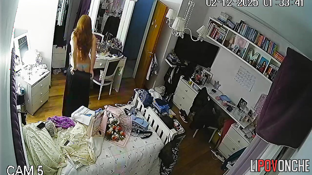 After returning from a social gathering, the sexy beauty strips down to her panties