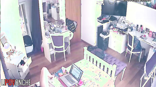 A young cutie listens to music while playing with her wet pussy under her panties