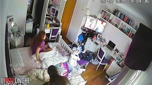 Upon waking up, two seductive lesbians bare their sexy breasts as they get dressed