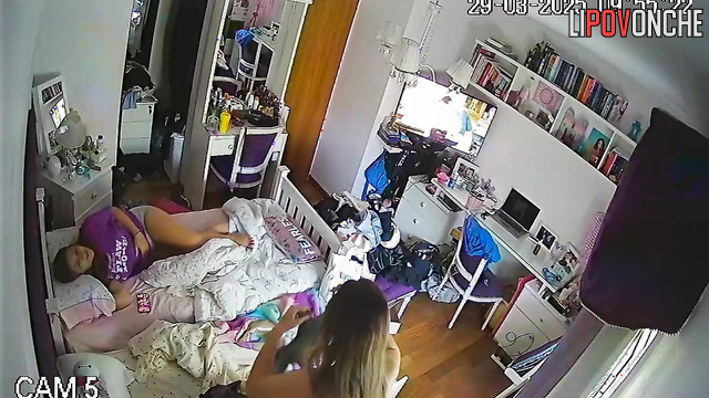 Upon waking up, two seductive lesbians bare their sexy breasts as they get dressed