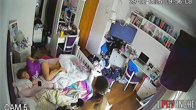 Upon waking up, two seductive lesbians bare their sexy breasts as they get dressed