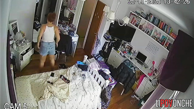 A naked young woman is getting dressed for a date with her lover