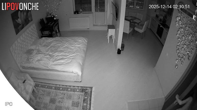 A skinny girl tries to seduce her husband by shining her phone on her butt