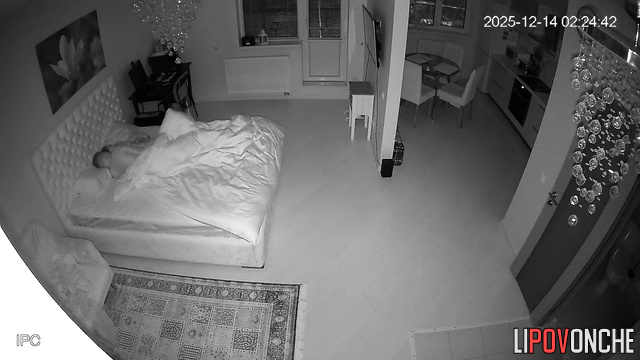 A skinny girl tries to seduce her husband by shining her phone on her butt
