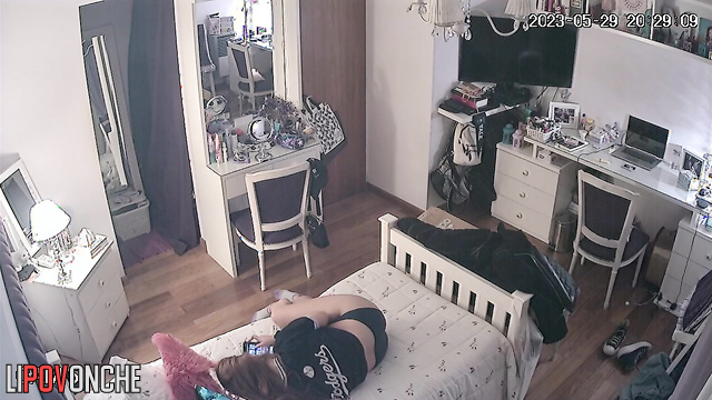 Young pretty babe changes her clothes and accidentally shows her tits on camera