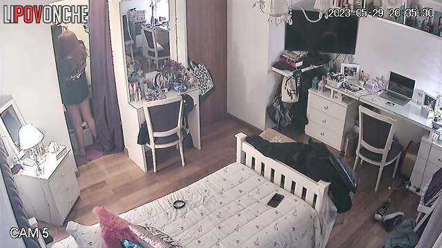 Young pretty babe changes her clothes and accidentally shows her tits on camera