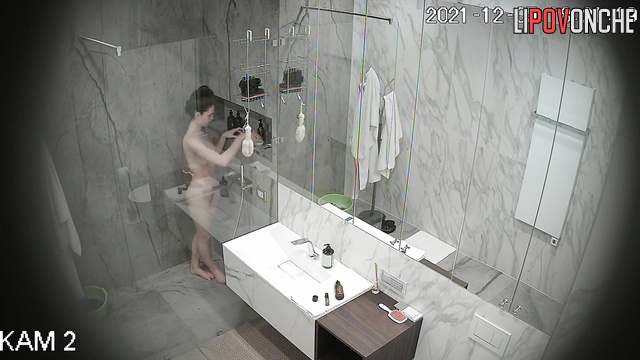 This sexy lady likes to do cleaning in bath absolutely naked showing her body