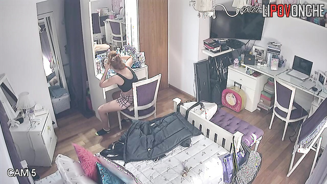 This girl is doing her everyday stuff in her sexy home clothes