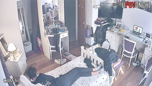 A guy pulls down his redheaded girlfriend's pants and caresses her butt