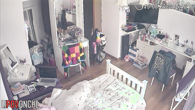 A red-haired teenage girl is secretly watching porn on her phone