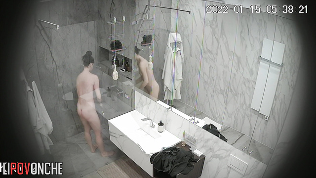 A naked, fat milf and a cute, sporty girl with a hairy pussy take turns showering
