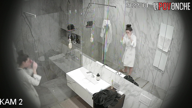 A naked, fat milf and a cute, sporty girl with a hairy pussy take turns showering