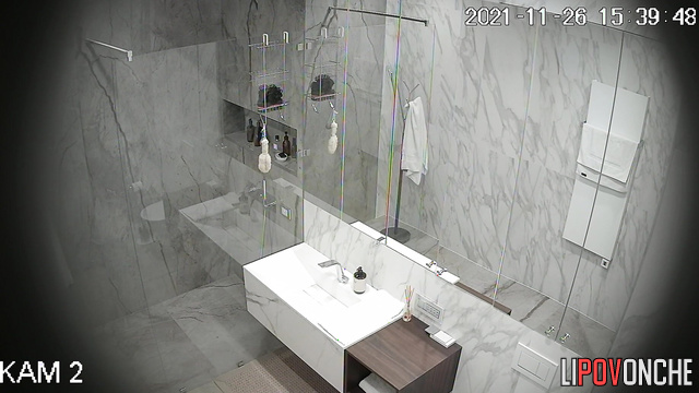 A skinny, sporty cutie is vigorously lathering up her hairy pussy in the shower