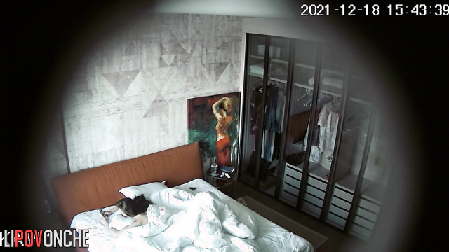 After a rest, the young athlete with a hairy pussy tidies up the bedroom