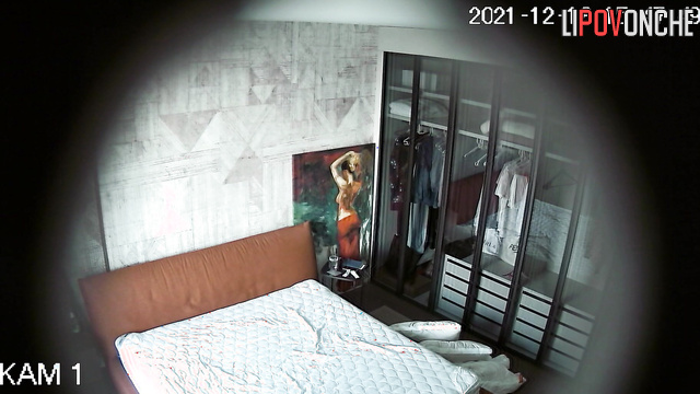 After a rest, the young athlete with a hairy pussy tidies up the bedroom