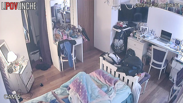 A red-haired beauty sniffs a used panty liner while wearing her panties down