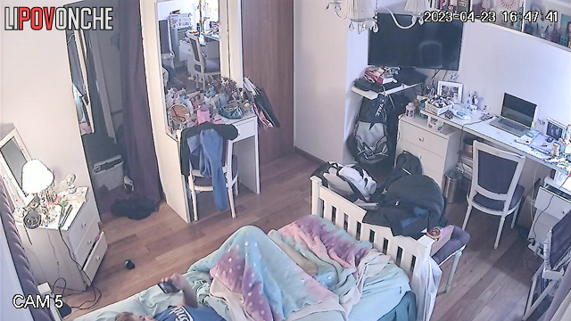 A red-haired beauty sniffs a used panty liner while wearing her panties down