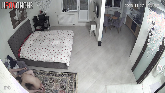 A naked man tries to pull his wife off the toilet to have sex with her