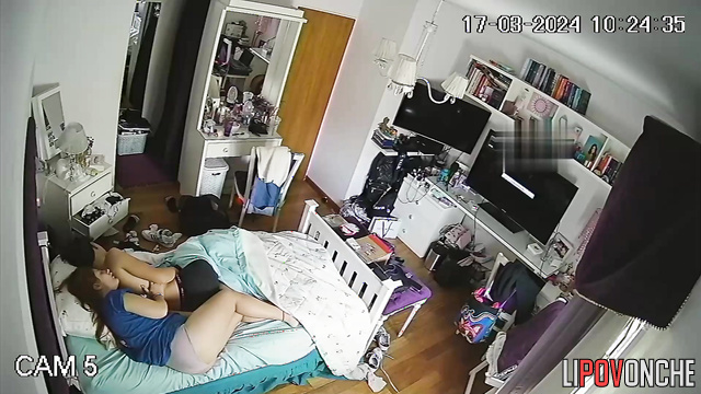 The red-haired girl presses her sexy body tightly against boyfriend's back