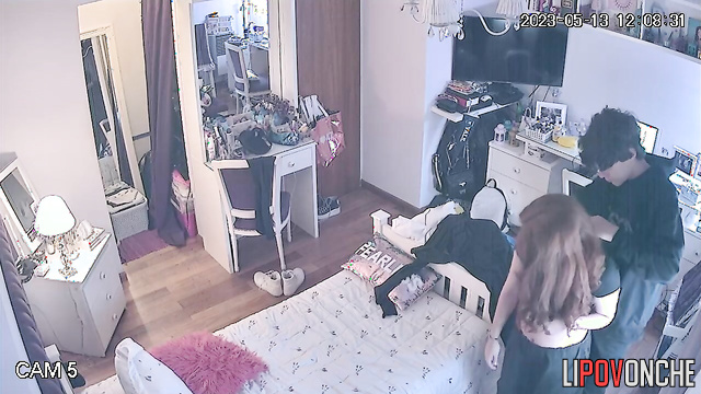 The student isn't shy about undressing in front of her male fellow student