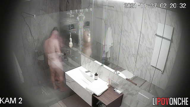 A man with an erection watches as his wife undresses before taking a shower