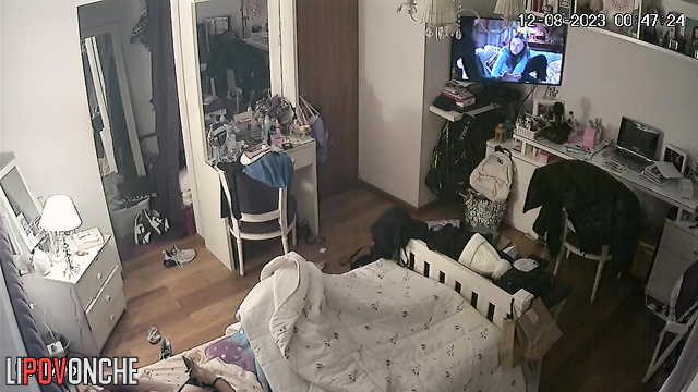 The girl took a break from the TV show for some pleasurable masturbation