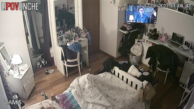 The girl took a break from the TV show for some pleasurable masturbation