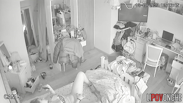 A bored college student pulls down her panties and plays with her labia