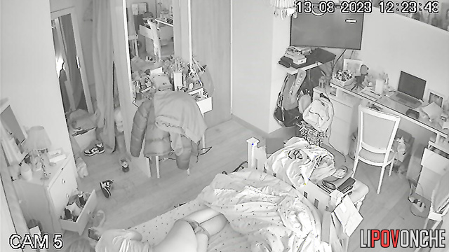 A bored college student pulls down her panties and plays with her labia