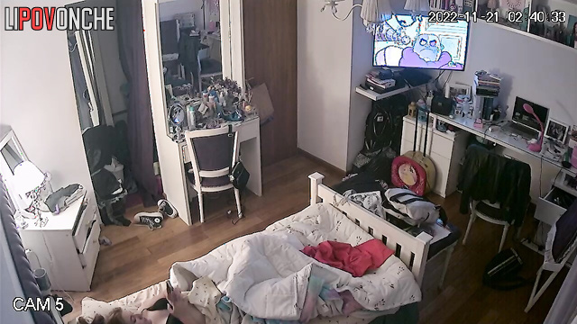 After her orgasm, the redheaded girl pulls her panties up over her bare bottom