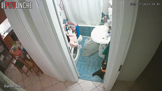 The girl seductively slips out of her sexy black nightgown before taking a shower