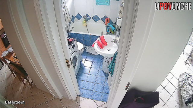 After cleaning, the housewife pulled down her pants and sat on the toilet