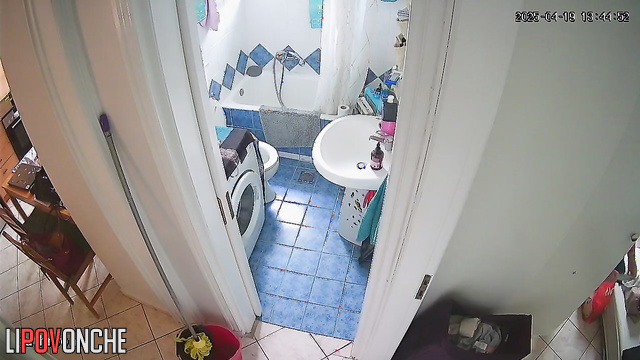 As she was getting ready to go for a walk, the girl pulled down her panties to pee
