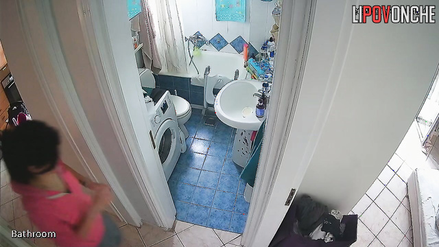 The cutie is typing a message in the chat app while also peeing