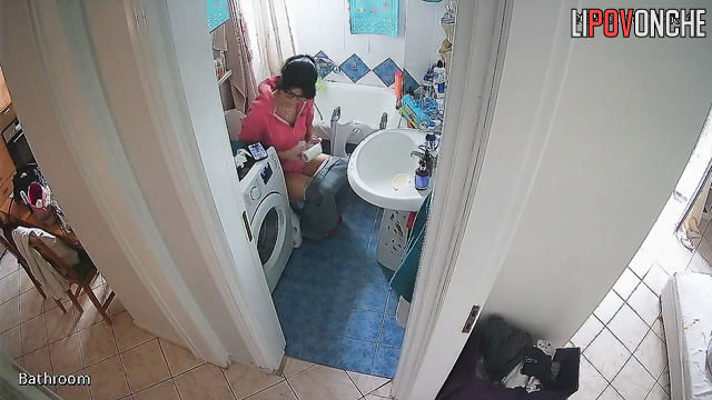 The cutie is typing a message in the chat app while also peeing