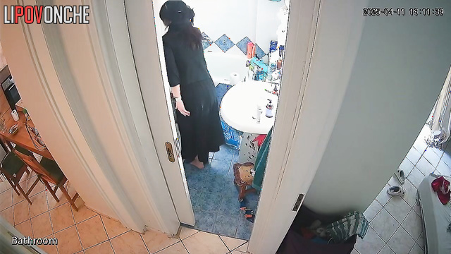 A stylish young teacher lifts the hem of her dress and pulls down her panties